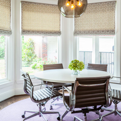 Trendy dark wood floor dining room photo in Houston with white walls
