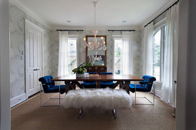 Example of a transitional enclosed dining room design in Houston