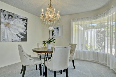 Example of a mid-century modern dining room design in Los Angeles