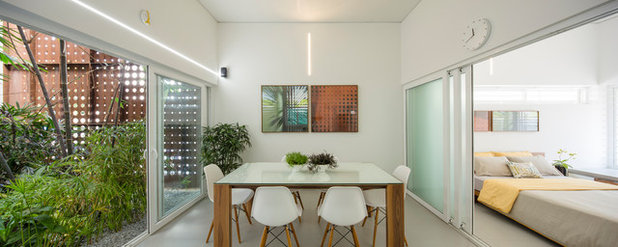 Contemporary Dining Room by LIJO.RENY.architects