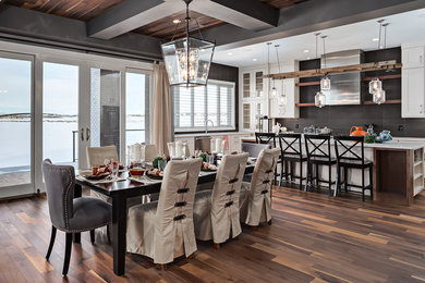 Large transitional medium tone wood floor dining room photo in Calgary