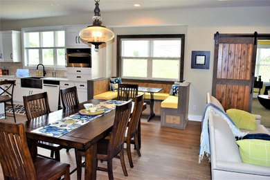 Example of a country dining room design in Grand Rapids