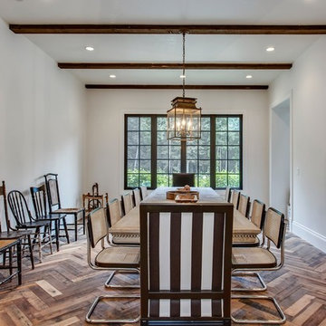 the Formal Dining Room with Antique side chairs.