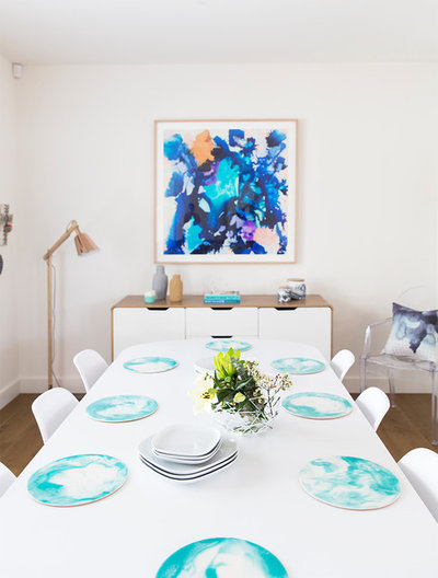 Beach Style Dining Room by Kreo Home