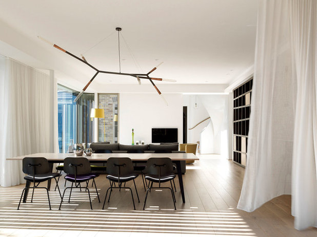 Transitional Dining Room by Luigi Rosselli Architects