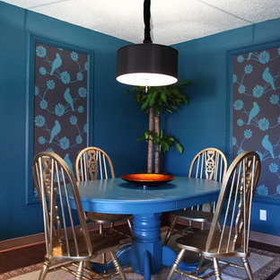 Dining room - eclectic dining room idea in Los Angeles with blue walls