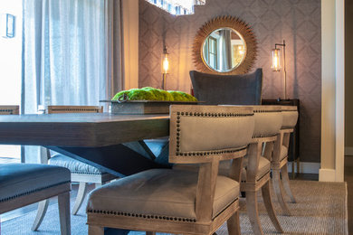 Large minimalist dark wood floor and brown floor kitchen/dining room combo photo in Denver with gray walls
