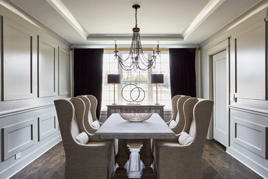 Inspiration for a transitional dark wood floor and brown floor dining room remodel in Chicago with gray walls and no fireplace