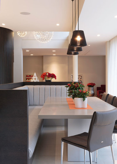 Contemporary Dining Room by Tollgard Design Group