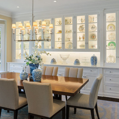Enclosed dining room - mid-sized traditional dark wood floor enclosed dining room idea in Cincinnati with beige walls and no fireplace
