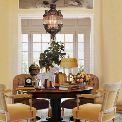 Example of a large classic carpeted enclosed dining room design in Other with yellow walls