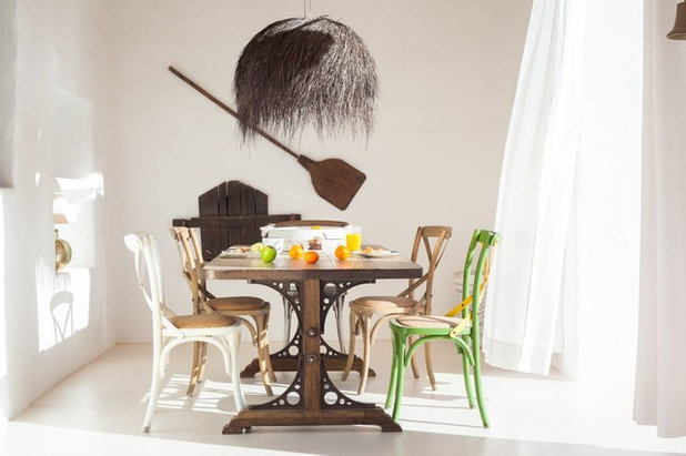 Mediterranean Dining Room by Kima design&build
