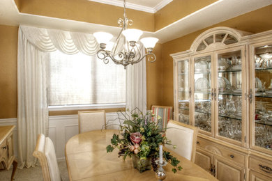 Elegant dining room photo in Denver