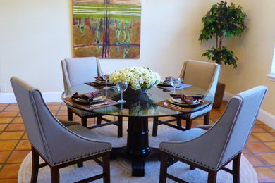 Large transitional terra-cotta tile great room photo in Miami with yellow walls and no fireplace