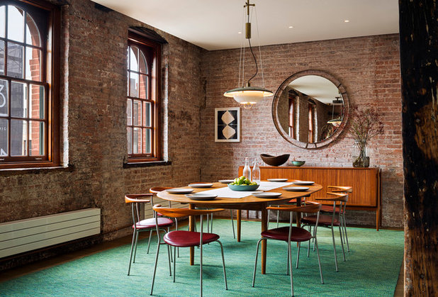 Industrial Dining Room by Andrew Franz Architect PLLC
