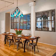 Industrial Dining Room by threshold interiors