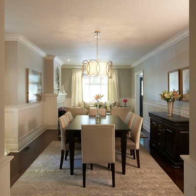 Elegant dark wood floor and brown floor dining room photo in Toronto with gray walls