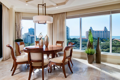 Dining room - traditional dining room idea in Miami with beige walls