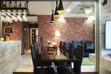 Cette photo montre une salle à manger ouverte sur le salon tendance avec un mur gris et un sol blanc.