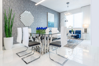Example of a mid-sized minimalist porcelain tile and white floor great room design in Miami with gray walls