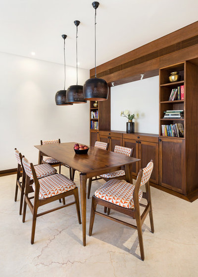 Midcentury Dining Room by We Design Studio