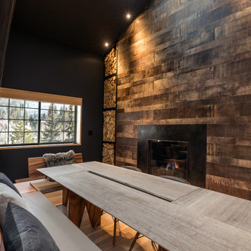Great Room's Dining Area with a Rustic Fireplace