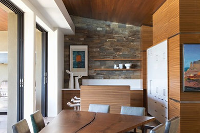 Large trendy limestone floor and beige floor kitchen/dining room combo photo in Phoenix