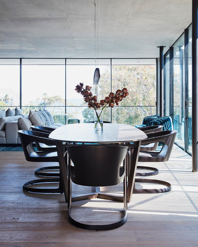 Contemporary Dining Room by Style Merchants