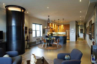Пример оригинального дизайна: гостиная-столовая среднего размера в современном стиле с серыми стенами и бетонным полом