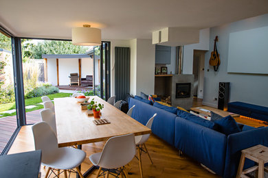 View of open-plan dining and living spaces from kitchen