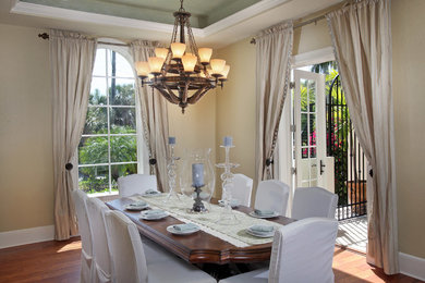 Design ideas for a mediterranean dining room in Miami.