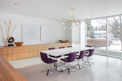 Dining room - large modern dining room idea in Calgary