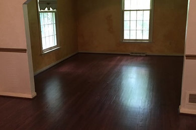 Mid-sized mountain style dark wood floor enclosed dining room photo in Philadelphia with beige walls and no fireplace