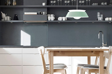 Small 1950s kitchen/dining room combo photo in New York