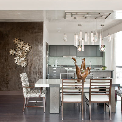 Example of a trendy dark wood floor kitchen/dining room combo design in Boston with white walls