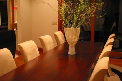 Mid-sized trendy medium tone wood floor dining room photo in Charleston