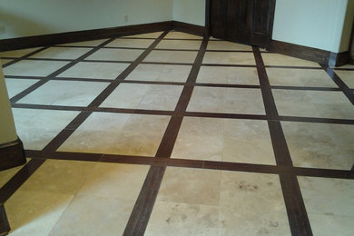 Mid-sized elegant dark wood floor enclosed dining room photo in Houston with beige walls and no fireplace