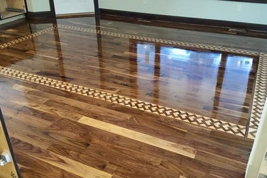 Walnut flooring with a custom table border installed