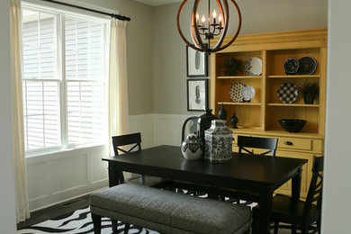 Inspiration for a transitional dark wood floor dining room remodel in Chicago with gray walls