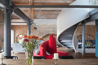 This is an example of a large urban open plan dining room in London.