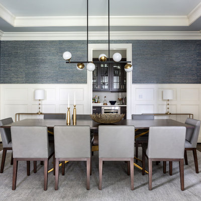 Inspiration for a transitional dark wood floor and brown floor dining room remodel in DC Metro with blue walls