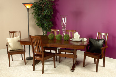 Mid-sized arts and crafts carpeted enclosed dining room photo in Other with no fireplace and pink walls