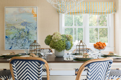 Beach style dining room photo in Providence with beige walls
