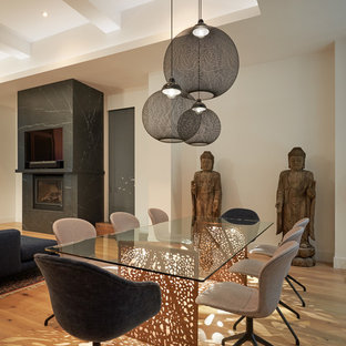 Great room - asian light wood floor and beige floor great room idea in New York with white walls