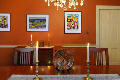 Inspiration for a large timeless great room remodel in New York with orange walls