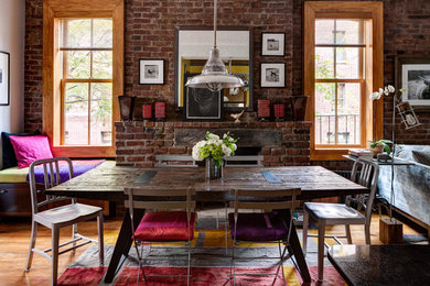 Example of an eclectic dining room design in New York