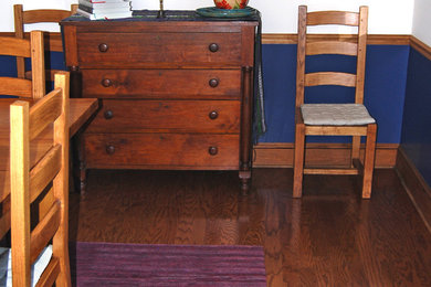 Inspiration for a mid-sized transitional dark wood floor kitchen/dining room combo remodel in Denver with blue walls