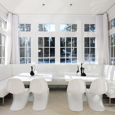 Dining room - contemporary dining room idea in New York with white walls
