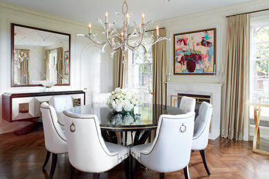 Inspiration for a timeless medium tone wood floor enclosed dining room remodel in Montreal