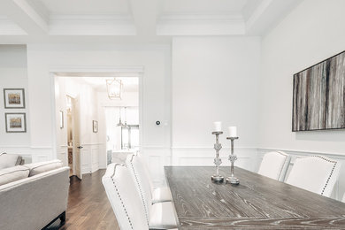 Inspiration for a large contemporary dark wood floor great room remodel in Toronto with white walls